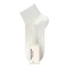 Three pairs of white pure cotton mid-calf socks for both men and women Item Picture